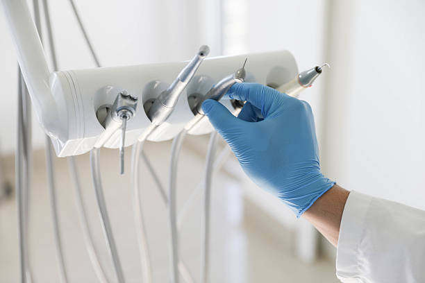 Professional Root Canal Treatment technician working in East Griffin, GA